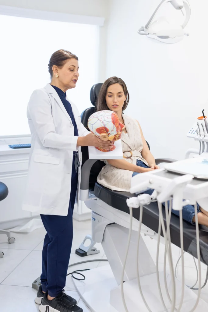 Dr. M. Azadeh Afzali discussing treatment options with a patient