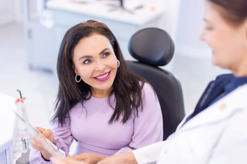 Dr. M. Azadeh Afzali discussing treatment options with a patient