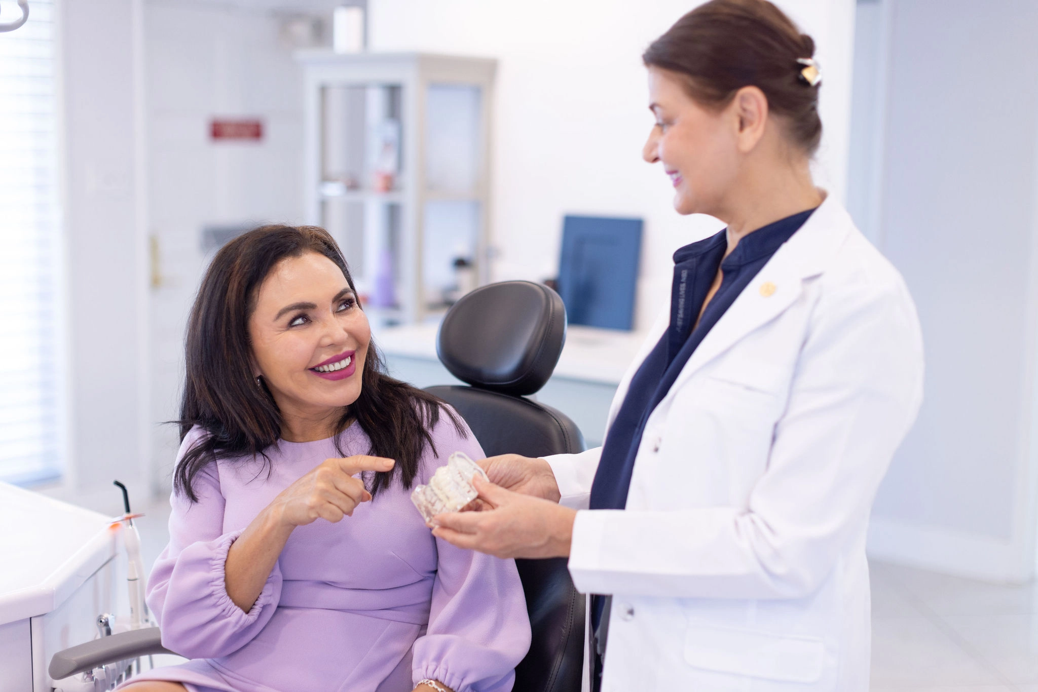 Dr. M. Azadeh Afzali providing personalized care and guidance to a patient