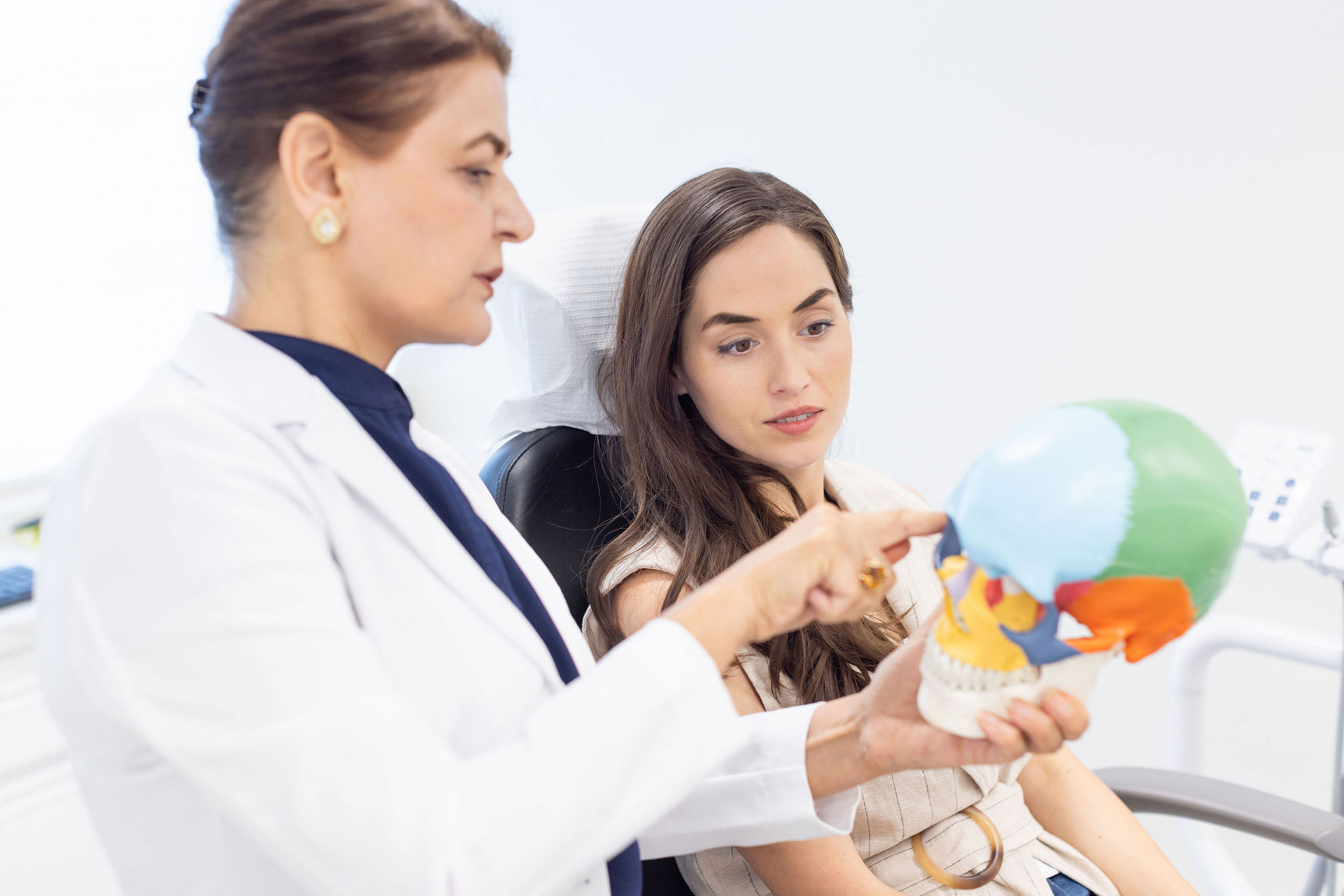 Dr. M. Azadeh Afzali discussing treatment options with a patient